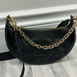 Louis Vuitton black calfskin bubblegram Over The Moon. Perfect condition.